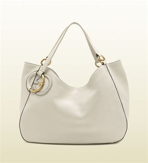 gucci k way|white gucci shopping bag.